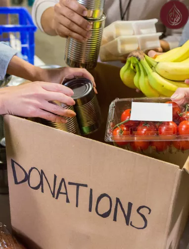 Which Muslim charity has a 100% donation policy?