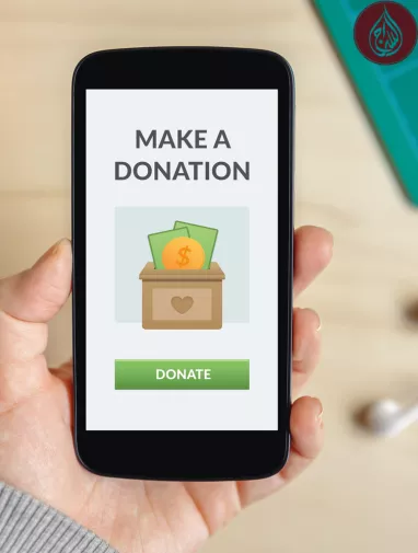 Which Muslim charity has a 100% donation policy?