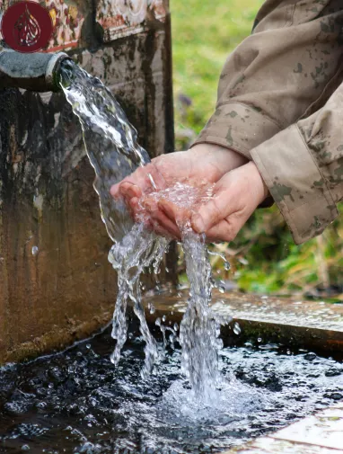 Which charity focuses on providing clean water projects? As-Siraj Charity